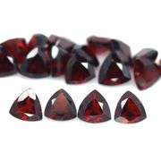 Stunning wine red 10.27ct trillion cut untreated Garnet set