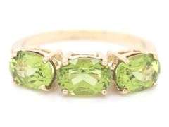 9kt Yellow gold oval Peridot and diamond accent ring