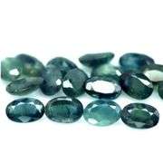 Heated only! 10.52ct blue green Sapphire set