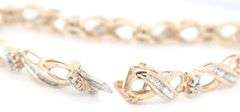 10kt Yellow gold 1.50ctw baguette and round diamond bracelet