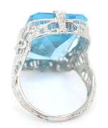 18kt White gold 13.50ct blue Topaz in punch work setting