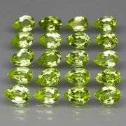 Fantastic 8.59ct 6x4mm pear cut Peridot set