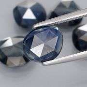 Heated only! 7.12ct blue green Sapphire set