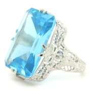 18kt White gold 13.50ct blue Topaz in punch work setting
