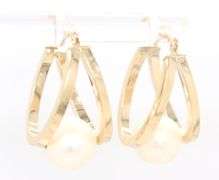 14kt Yellow gold double oval hoop earrings with pearl center
