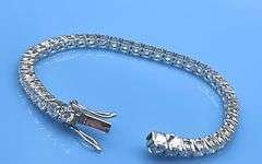14 Kt White Gold Plated Huge 24.5 Ctw Lab Simulated Diamond Tennis Bracelet