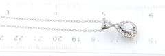 Vintage 925 sterling silver pear shaped Cubic Zirconoa halo pendant on chain