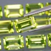 Brilliant 7.84ct 13pc set of matched baguette cut Peridot