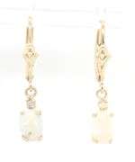 14kt Yellow gold oval opal and diamond dangle earrings