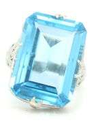 18kt White gold 13.50ct blue Topaz in punch work setting