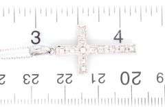 18kt White gold .25ctw diamond cross pendant on chain