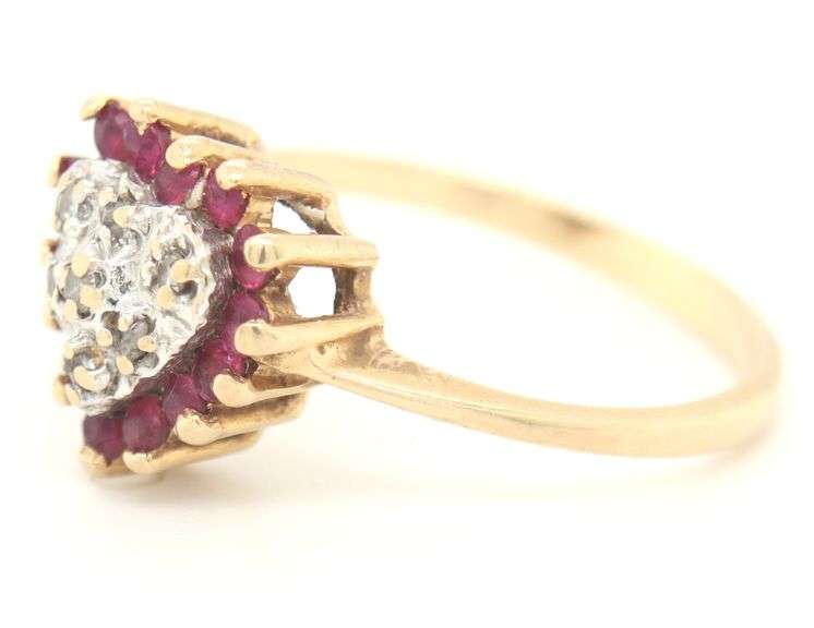 14kt Yellow gold ruby and diamond heart shaped ring