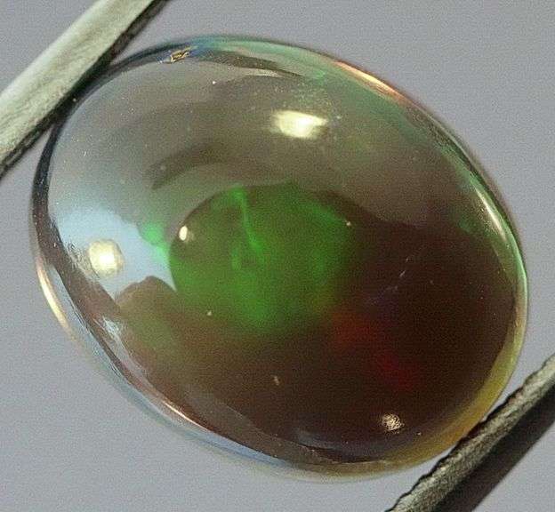 Glistening 1.78ct fiery flashing Welo Black Opal