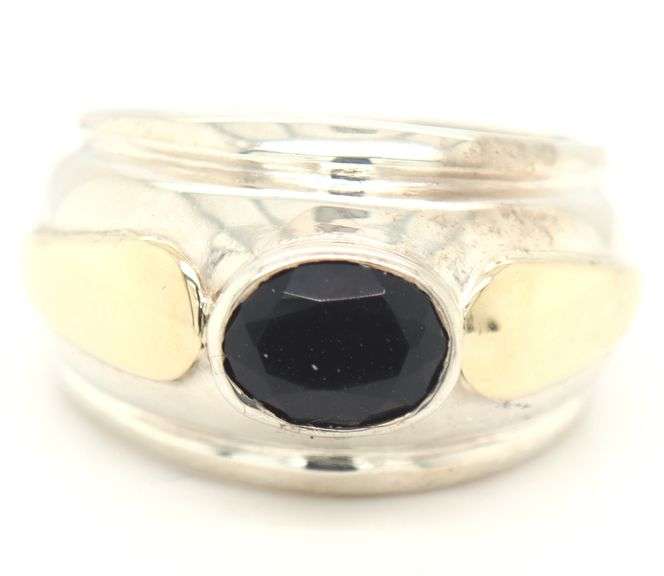 Oval Garnet silver and gold ring