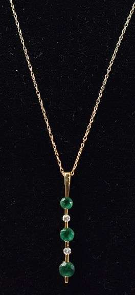 Ravishing Emerald and Diamond Pendant Necklace in 14K Yellow Gold