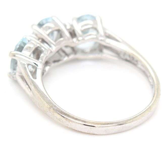 14kt White gold oval Aquamarine and diamond accent 3 stone ring