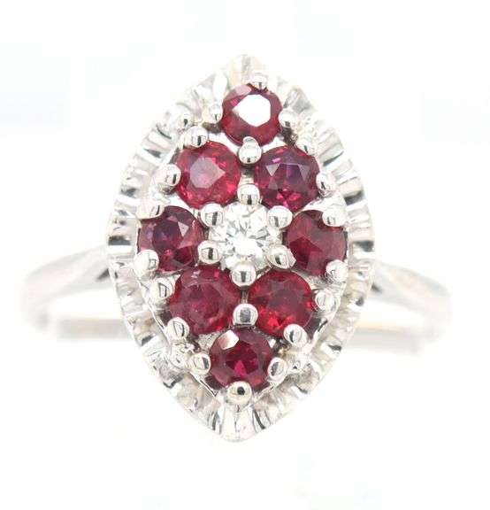 14kt White gold Ruby and diamond cluster marquise shape ring