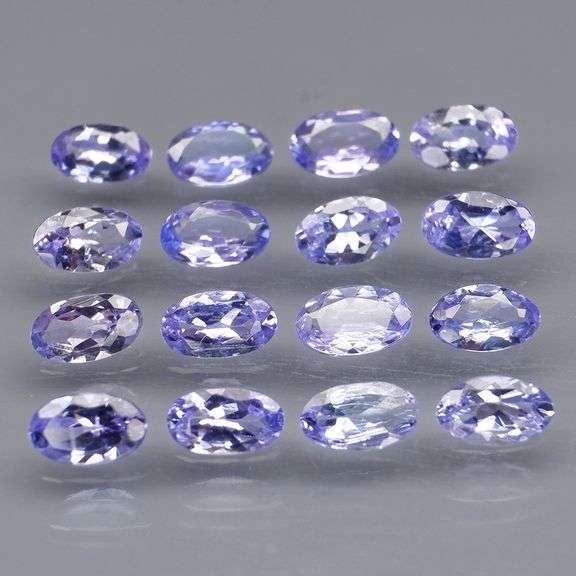Heavy flashing 3.62ct oval cut Tanzanite set