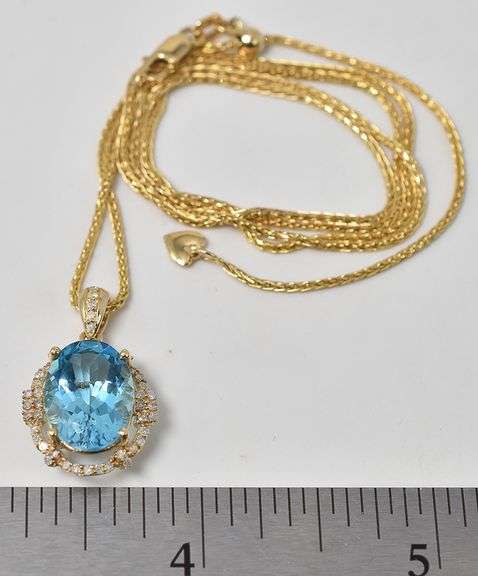 Brilliant Blue Topaz and Diamond Pendant in 14K Yellow Gold