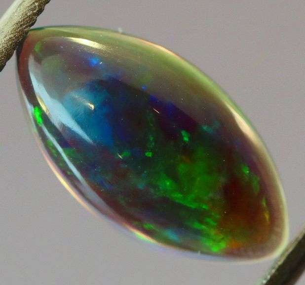 Outstanding 1.18ct full body flashing Black Opal