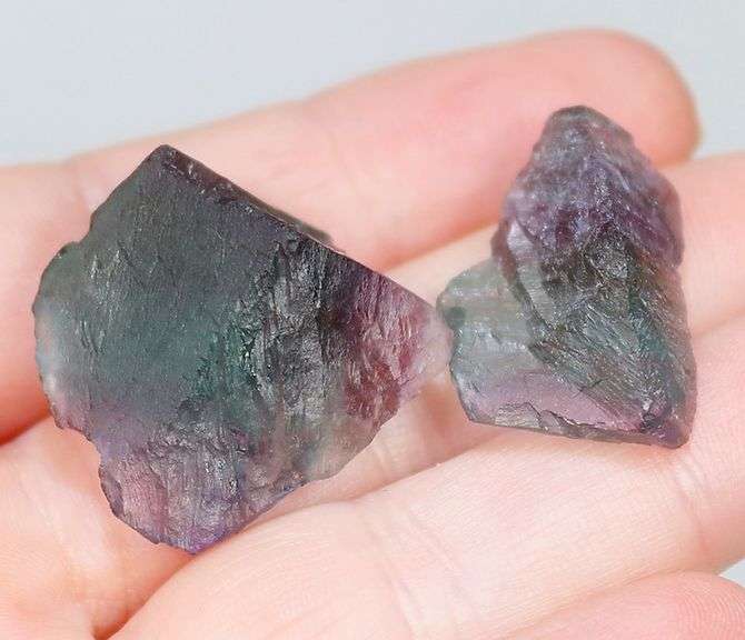 Glowing 80ct rough bi-color Fluorite pair