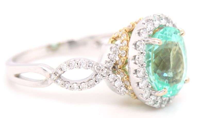 18kt White gold Green Tourmaline and diamond halo cocktail ring