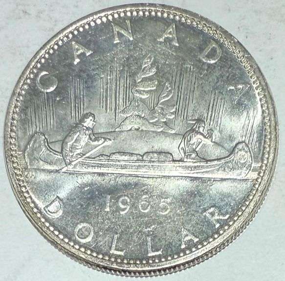 1965 Large  Beed Blunt 5 BU Canada Silver Dollar.