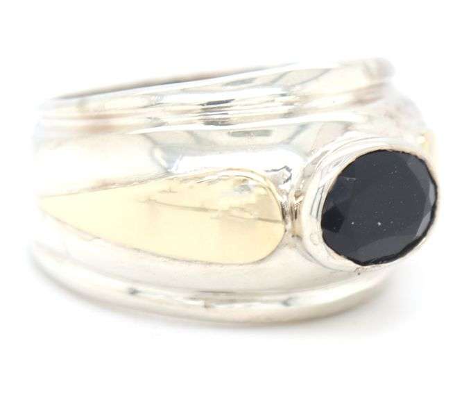 Oval Garnet silver and gold ring