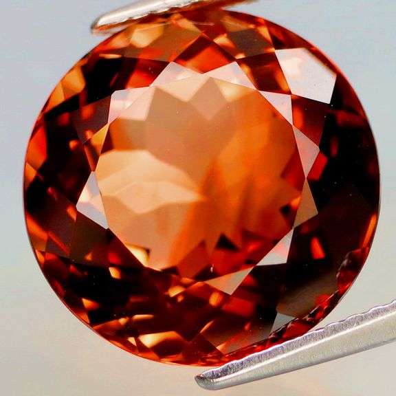 Impressive 12.74ct full fire VS Imperial Topaz solitaire