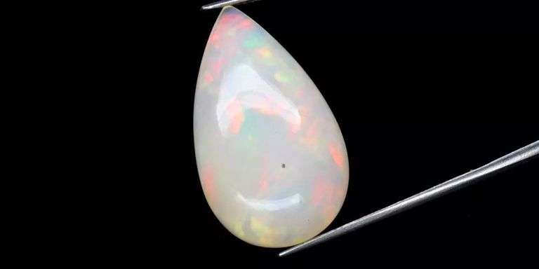 Ravishing 14.43ct snow white Yita Ridge Opal