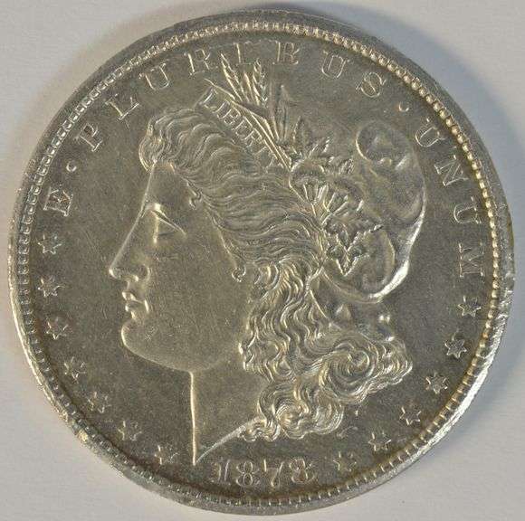 Fully struck Mint State 1878-CC Morgan Silver Dollar. Cleaned