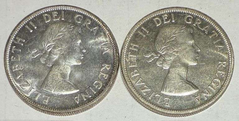 Both Varieties 1957 BU Canada Silver Dollars