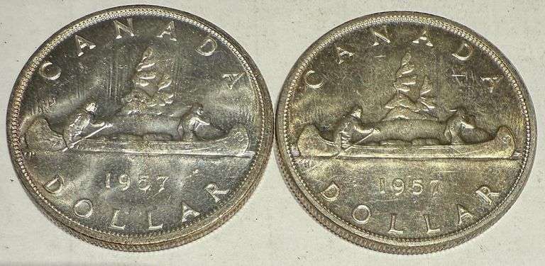 Both Varieties 1957 BU Canada Silver Dollars
