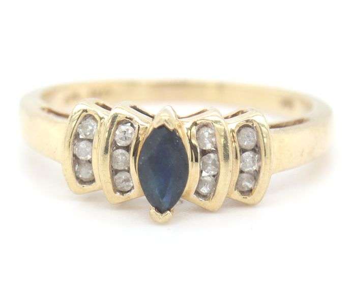 10kt Yellow gold blue sapphire and diamond ring