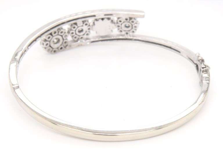 14kt White gold 2.15ctw 4 flower diamond bypass bangle bracelet