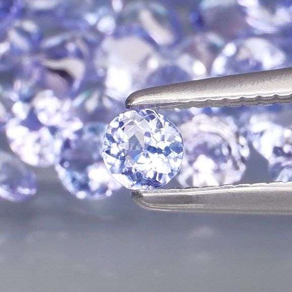 Non stop flashing 3.09ct diamond cut Tanzanite set