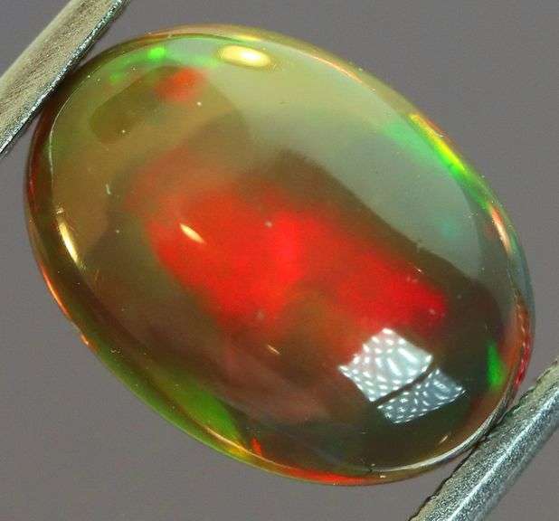 Fantastic 2.35ct black Opal cabochon