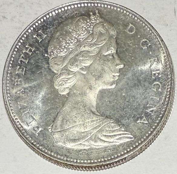 1965 Large  Beed Blunt 5 BU Canada Silver Dollar.