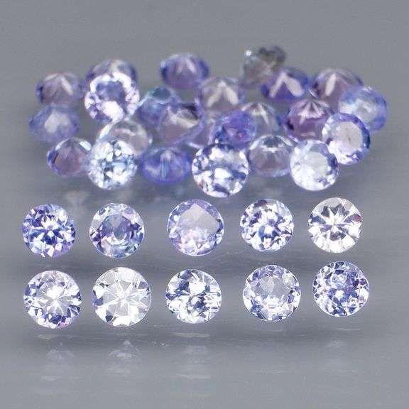 Heavy flashing 4.02ct diamond cut Tanzanite set