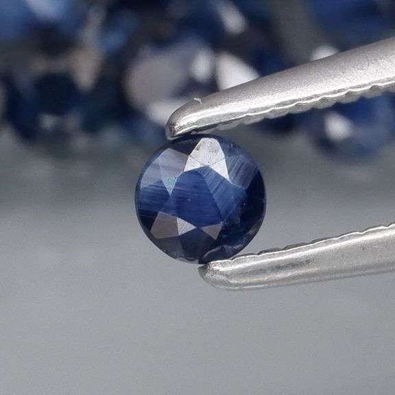 Excellent 3.99ct denim blue Sapphire set