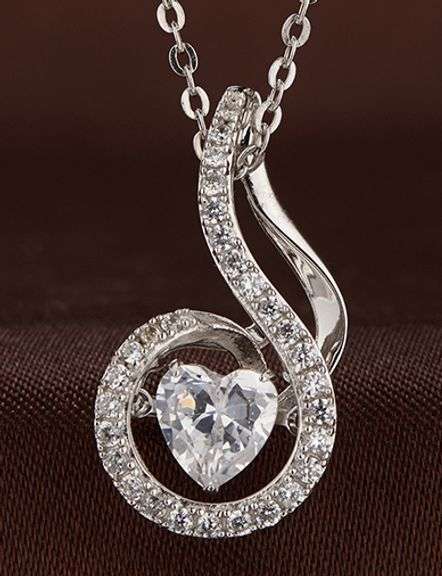 Beautiful center stone dancing pendant in solid sterling silver