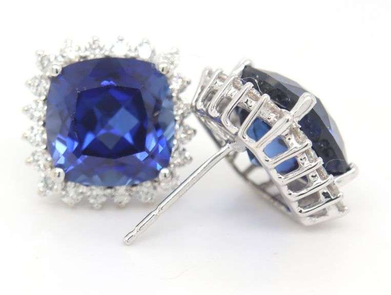 14kt White gold synthetic blue sapphire and diamond halo stud earrings