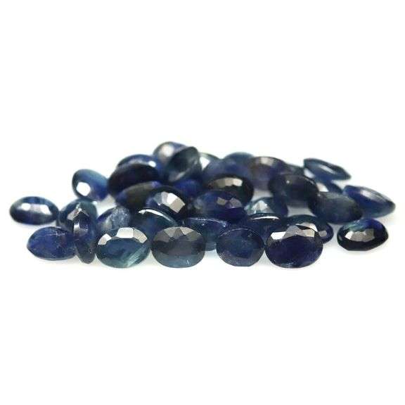 Glistening 10.05ct deep blue Sapphire set