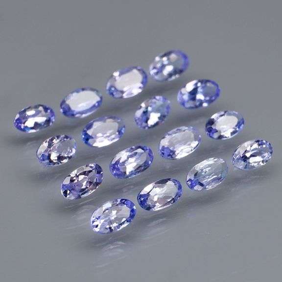 Heavy flashing 3.30ct oval cut Tanzanite set