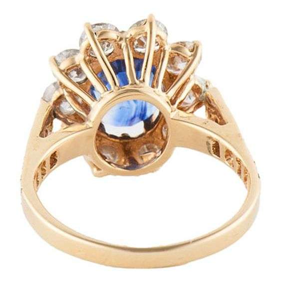 1.75ct Oval Sapphire and 2.00ctw Diamond Starburst Frame Ring in 14K