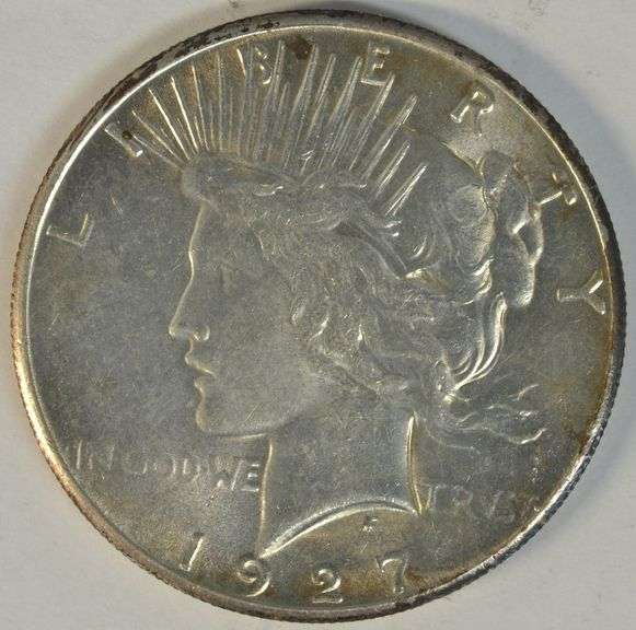 Fully struck and lustrous 1927 Peace Silver Dollar.