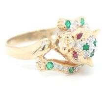 14kt Yellow gold emerald, diamond and ruby eyes panther ring