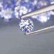 Heavy flashing 3.91ct diamond cut Tanzanite set