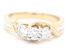 10kt Yellow gold 0.65ctw 3 stone diamond Illusion set engagement ring