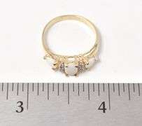 Elevated 10K Yellow Gold Opal Gemstone and Diamond Ring